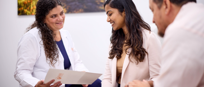 A breast cancer patient meeting with her doctor to discuss treatment options.