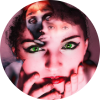 Artistic photo of a woman with bright green eyes and transparent floating faces above her, symbolizing hallucinations or altered perception.
